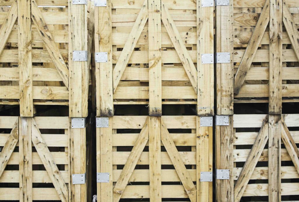 Export Crates A photo of wooden export crates stacked for shipping.